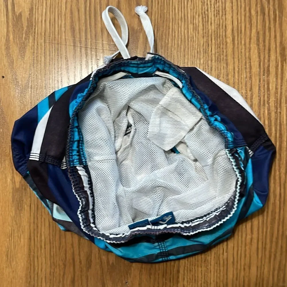 Kanu surf swimming shorts. Drawstring waist. Size medium. Size 10/12. Pocket.